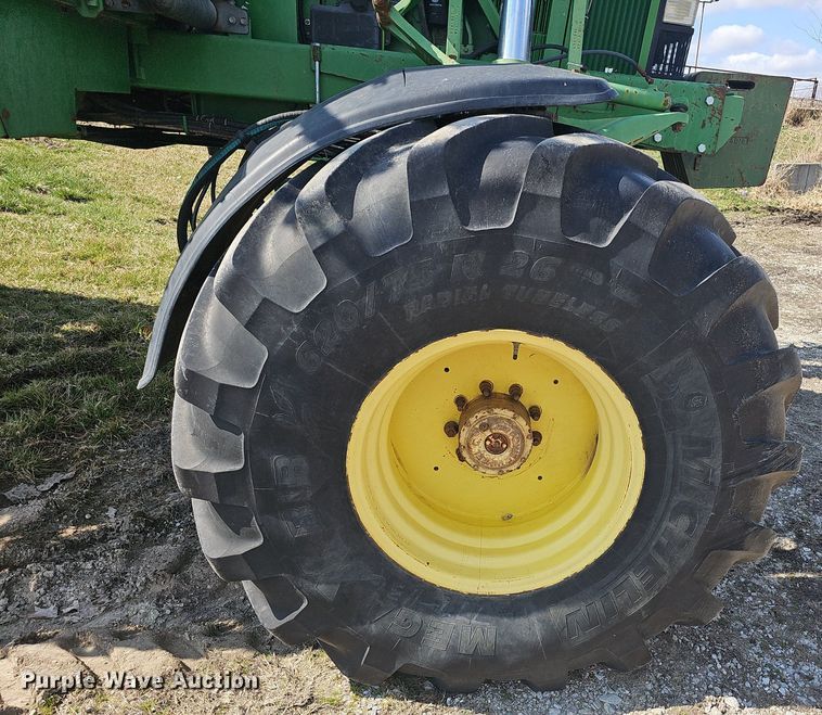 image for item EJ6064 1999 John Deere 4700 sprayer