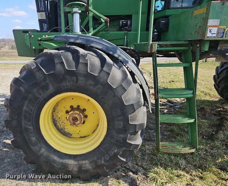 image for item EJ6064 1999 John Deere 4700 sprayer