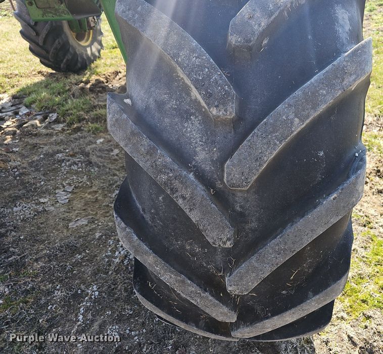 image for item EJ6064 1999 John Deere 4700 sprayer