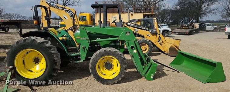 image for item EJ6067 1993 John Deere 5400 MFWD tractor