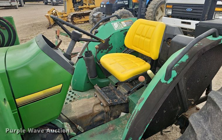 image for item EJ6067 1993 John Deere 5400 MFWD tractor