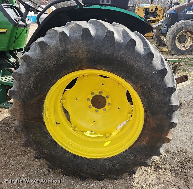 image for item EJ6067 1993 John Deere 5400 MFWD tractor