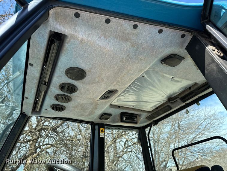 image for item NH9007 1997 New Holland  5635 MFWD tractor