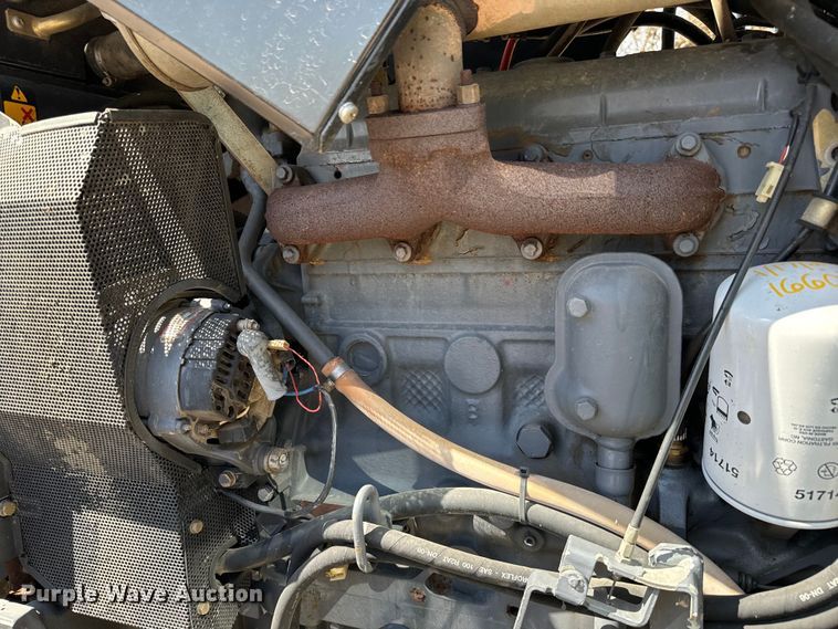 image for item NH9007 1997 New Holland  5635 MFWD tractor