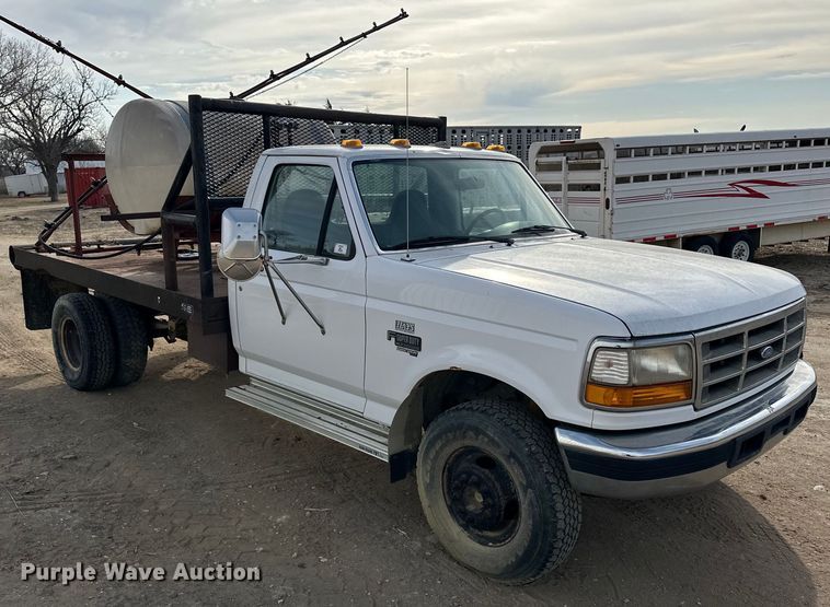 image for item NJ9425 1997 Ford F450 Super Duty XLT flatbed truck
