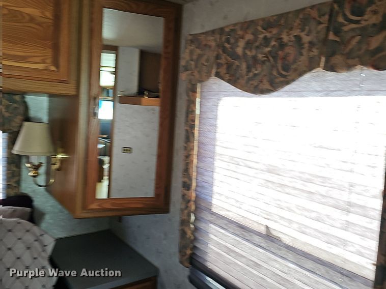 image for item DM1560 1998 Winnebago Adventurer RV