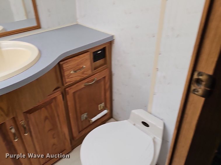 image for item DM1560 1998 Winnebago Adventurer RV