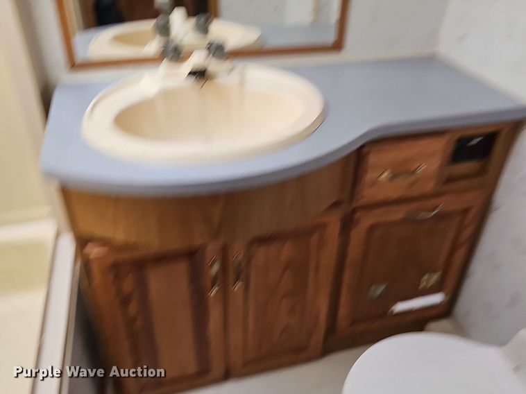 image for item DM1560 1998 Winnebago Adventurer RV