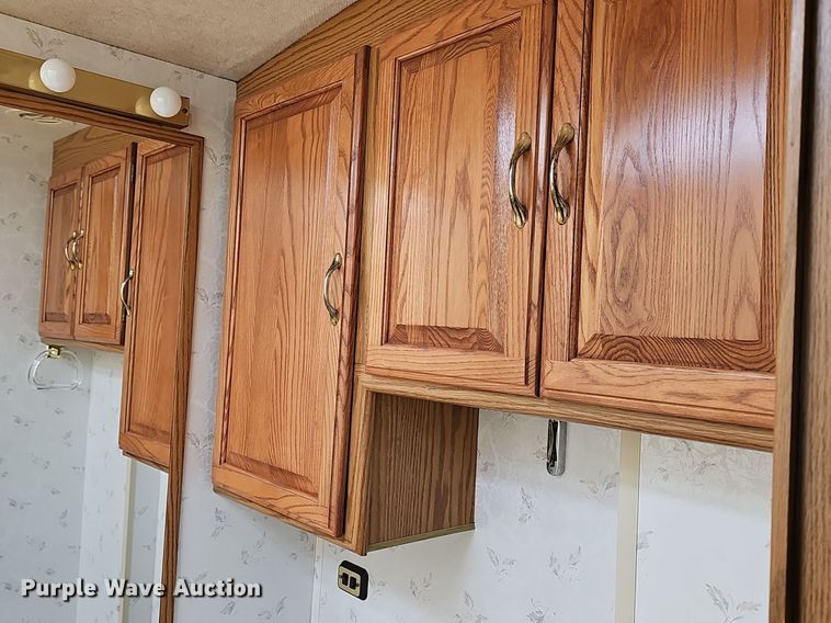 image for item DM1560 1998 Winnebago Adventurer RV