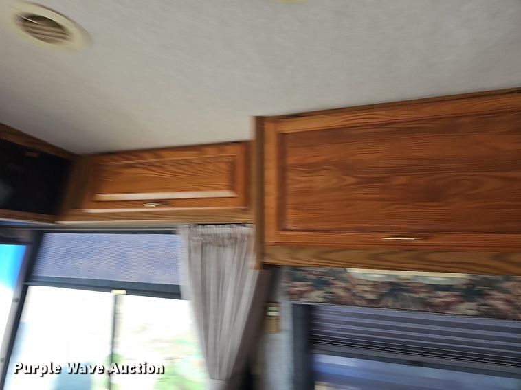 image for item DM1560 1998 Winnebago Adventurer RV