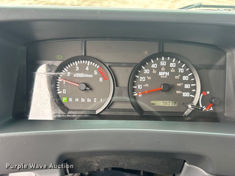 image for item EG1295 2016 Isuzu NPR flatbed truck