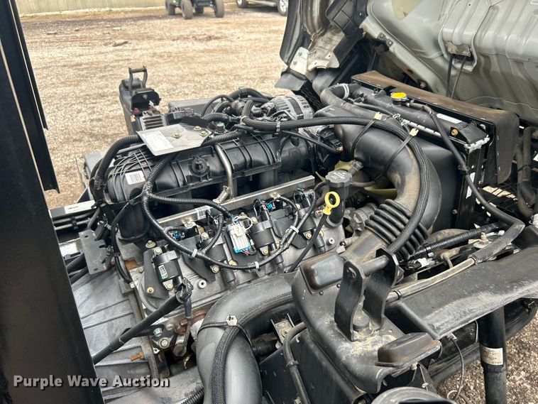 image for item EG1295 2016 Isuzu NPR flatbed truck