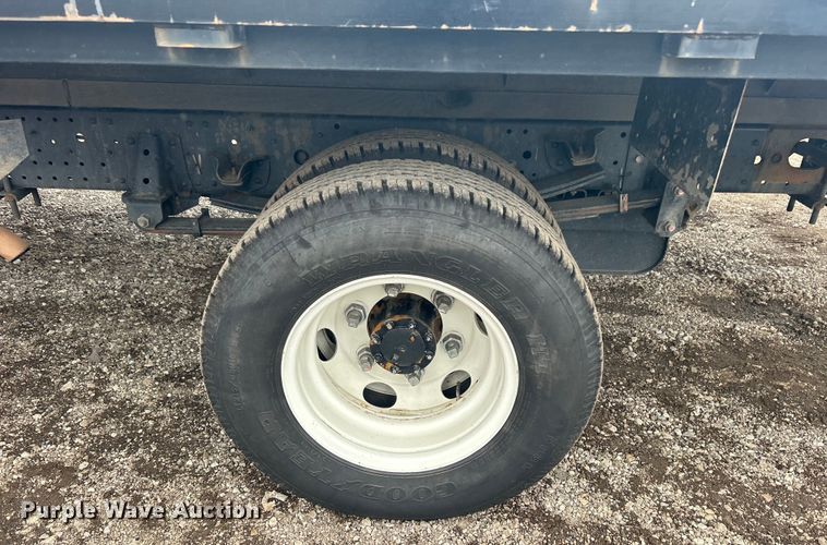 image for item EG1295 2016 Isuzu NPR flatbed truck