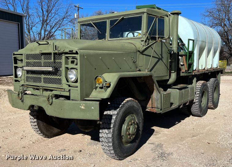 image for item JT9038 1985 Am General  M923 flatbed truck