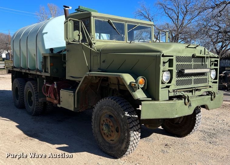 image for item JT9038 1985 Am General  M923 flatbed truck