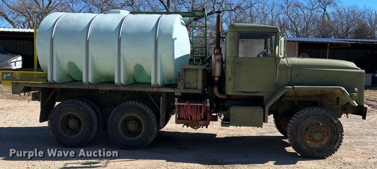 image for item JT9038 1985 Am General  M923 flatbed truck