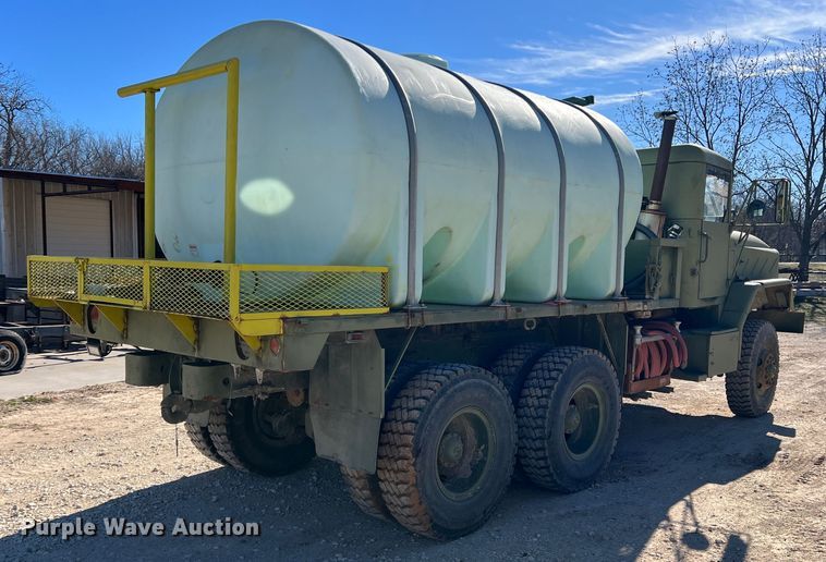 image for item JT9038 1985 Am General  M923 flatbed truck