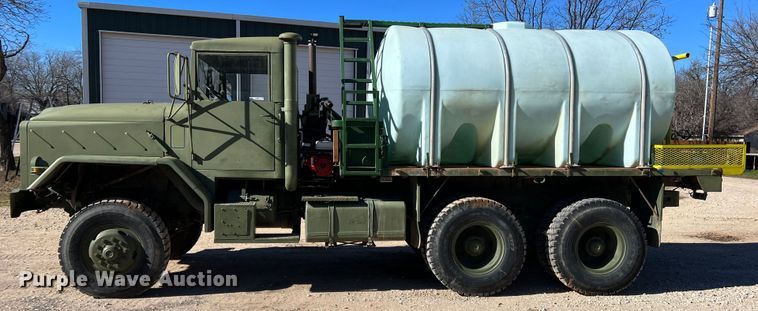 image for item JT9038 1985 Am General  M923 flatbed truck