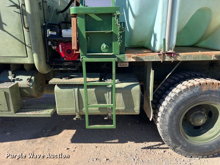 image for item JT9038 1985 Am General  M923 flatbed truck