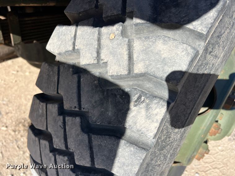 image for item JT9038 1985 Am General  M923 flatbed truck