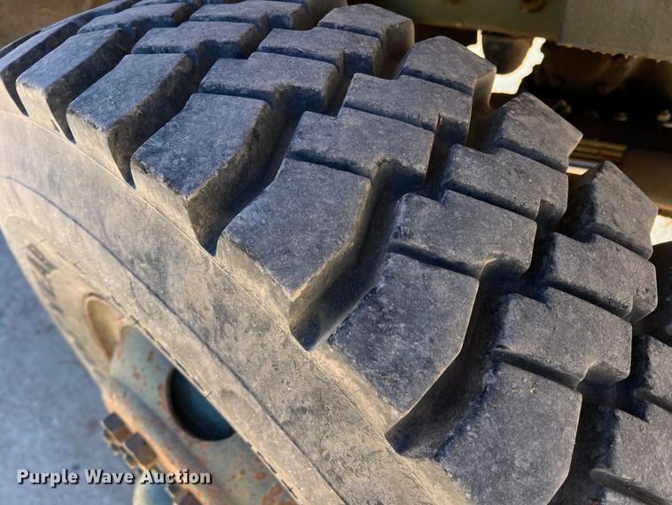 image for item JT9038 1985 Am General  M923 flatbed truck