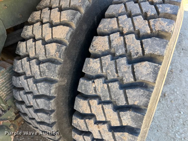 image for item JT9038 1985 Am General  M923 flatbed truck