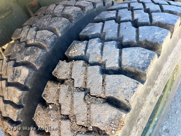 image for item JT9038 1985 Am General  M923 flatbed truck