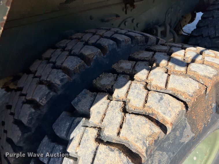 image for item JT9038 1985 Am General  M923 flatbed truck