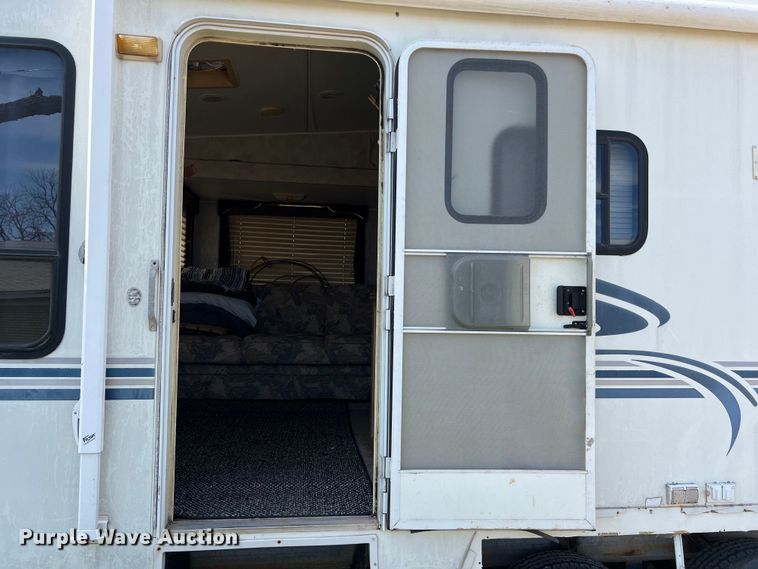 image for item KV9793 1999 Holiday Rambler Alumascape camper