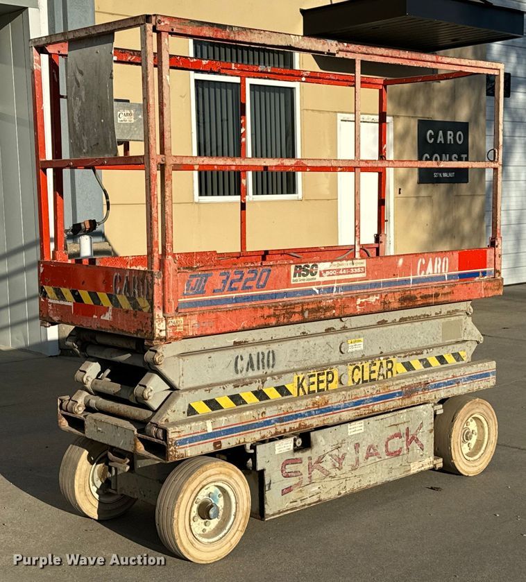 image for item NH9011 1997 SkyJack SJ3220 scissor lift