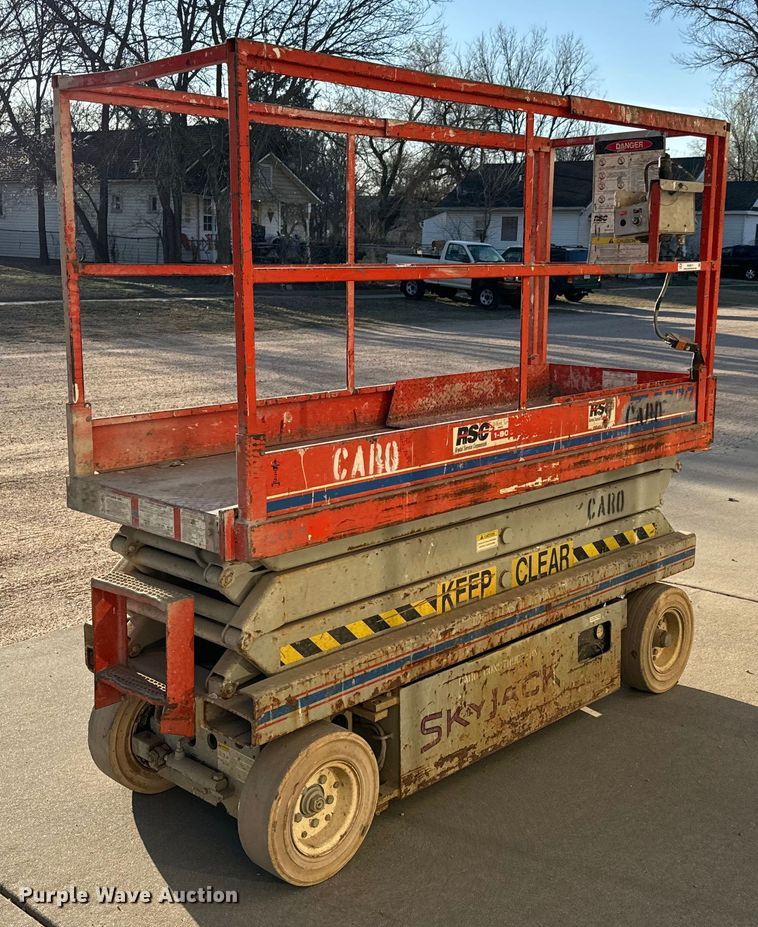 image for item NH9011 1997 SkyJack SJ3220 scissor lift