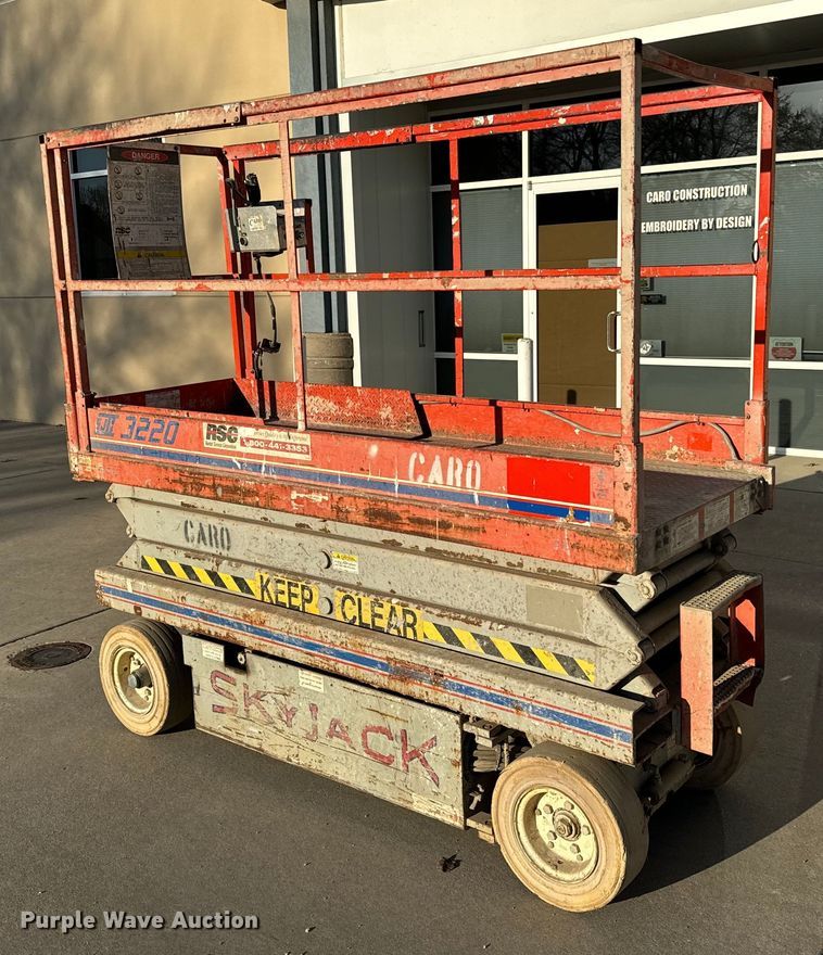 image for item NH9011 1997 SkyJack SJ3220 scissor lift