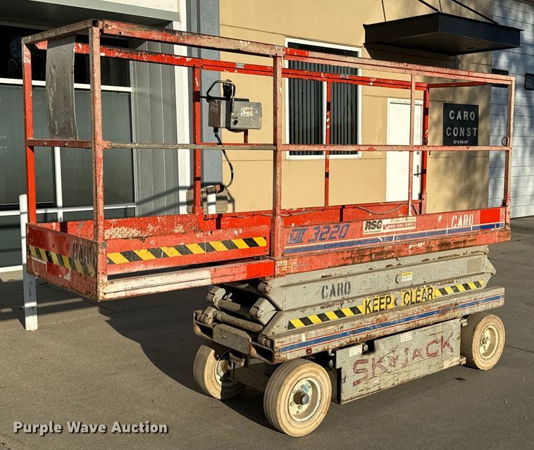image for item NH9011 1997 SkyJack SJ3220 scissor lift