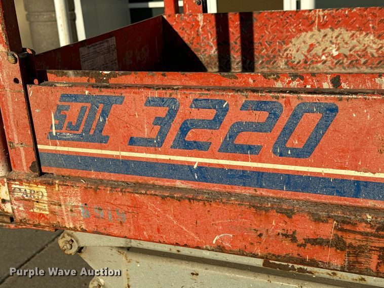 image for item NH9011 1997 SkyJack SJ3220 scissor lift
