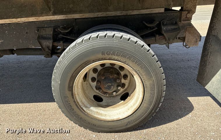 image for item NH9019 2000 Sterling  L7500 dump flatbed truck