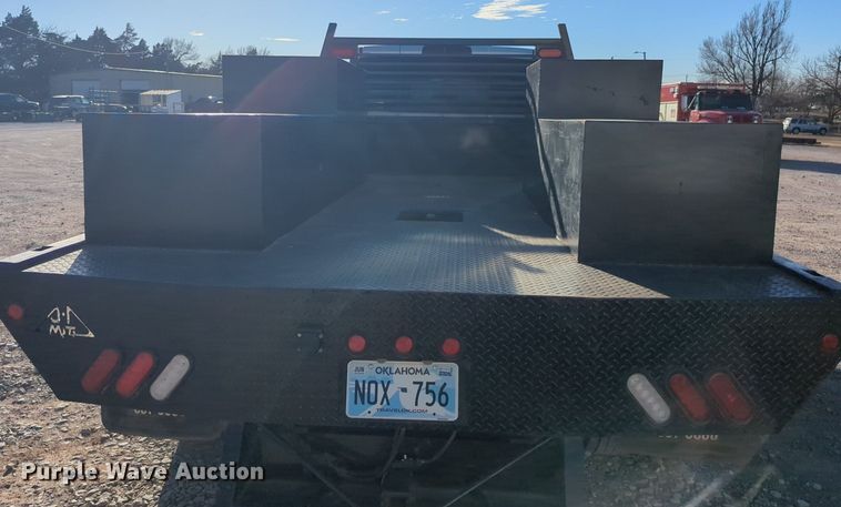 image for item NZ9332 2020 Dodge Ram 5500HD Crew Cab flatbed truck