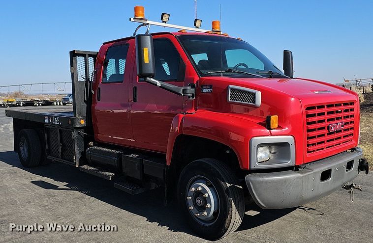image for item DK0695 2003 GMC C6500 flatbed truck
