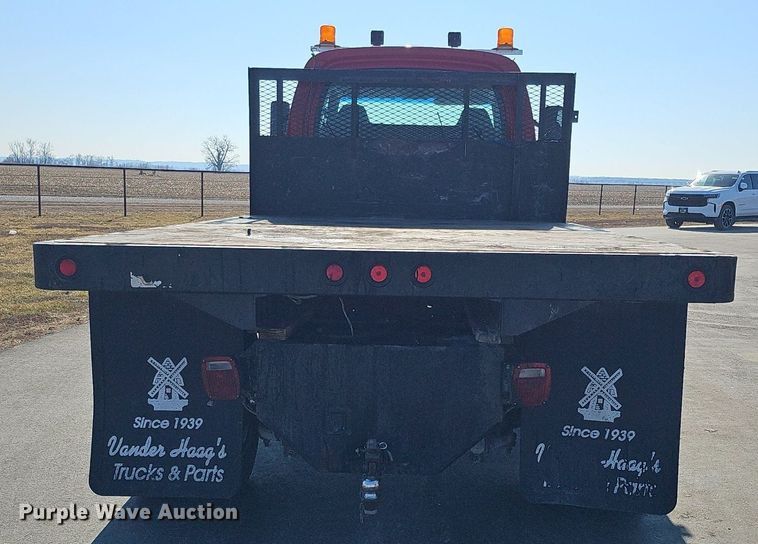 image for item DK0695 2003 GMC C6500 flatbed truck