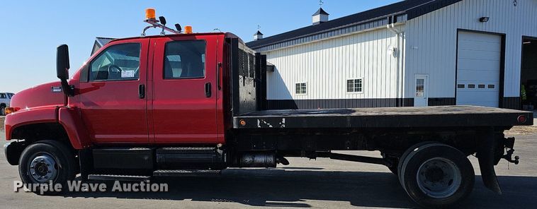 image for item DK0695 2003 GMC C6500 flatbed truck