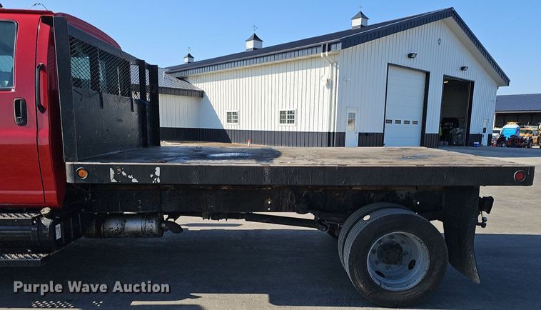 image for item DK0695 2003 GMC C6500 flatbed truck