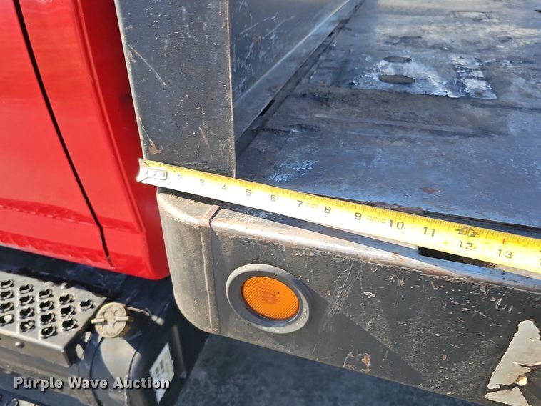 image for item DK0695 2003 GMC C6500 flatbed truck