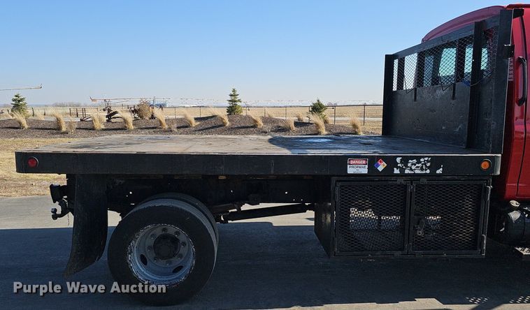 image for item DK0695 2003 GMC C6500 flatbed truck