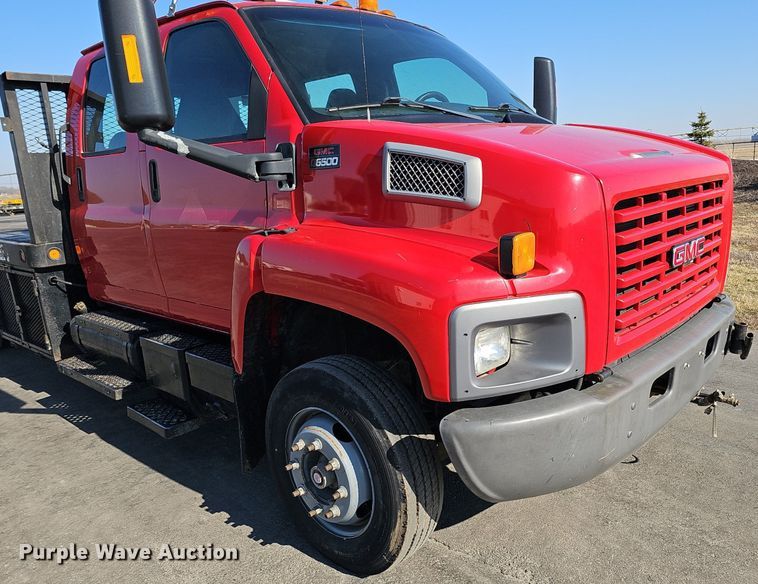 image for item DK0695 2003 GMC C6500 flatbed truck