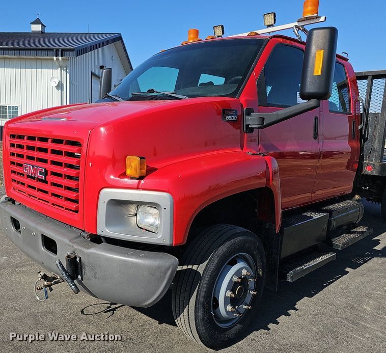 image for item DK0695 2003 GMC C6500 flatbed truck