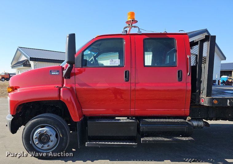 image for item DK0695 2003 GMC C6500 flatbed truck