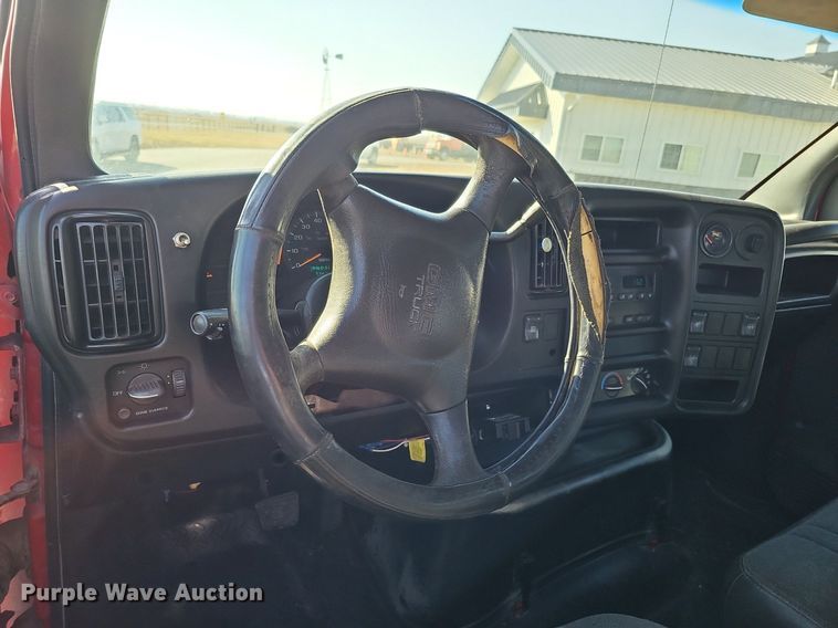 image for item DK0695 2003 GMC C6500 flatbed truck