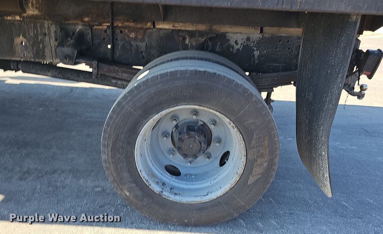 image for item DK0695 2003 GMC C6500 flatbed truck