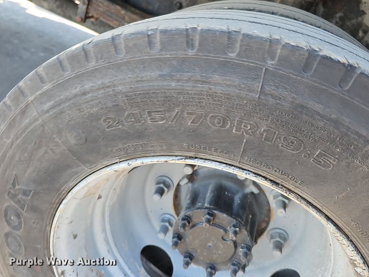 image for item DK0695 2003 GMC C6500 flatbed truck