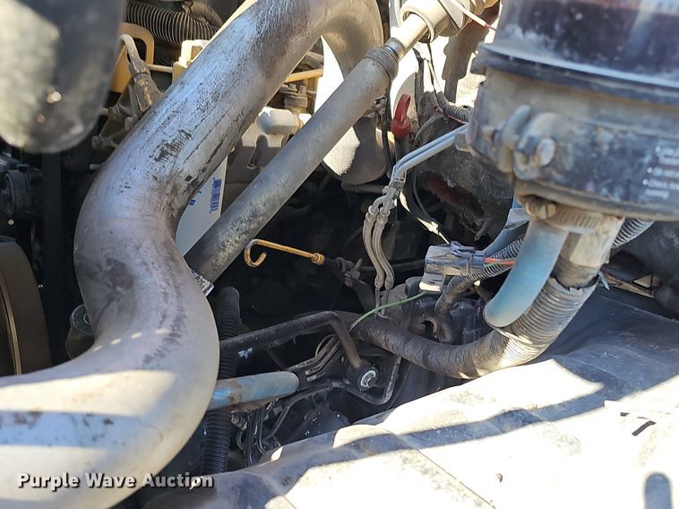 image for item DK0695 2003 GMC C6500 flatbed truck