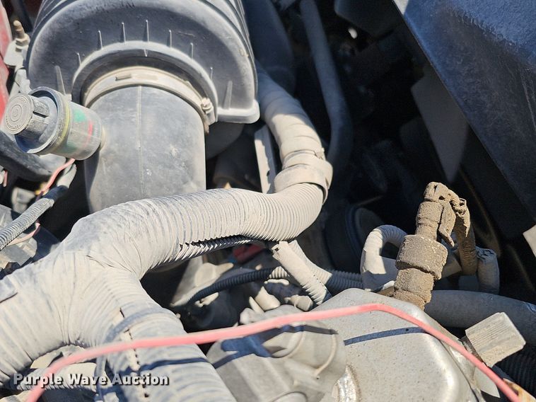 image for item DK0695 2003 GMC C6500 flatbed truck